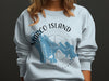 Light blue crewneck sweatshirt with Marco Island Florida map and compass graphic.