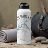 White water bottle with black lid, compass and "TS BAR LA" text design.