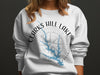White sweatshirt featuring a compass rose design overlaid with a blue map of Clarks Hill Lake, Georgia.