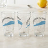 Three clear glasses with Kiawah Island South Carolina map and compass design.