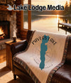 Woven blanket with Pavlas Lake Wisconsin design and compass rose.