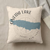 Oneida Lake map design on cream pillow with compass graphic and New York text.