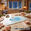 A glass cutting board featuring a Glen Lake, Michigan map design rests on a kitchen counter surrounded by baking ingredients.