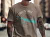 Brown t-shirt with Rathbun Lake Iowa map and compass graphic.