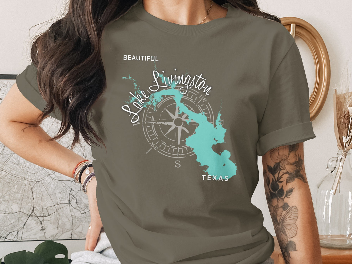T-shirt with turquoise map graphic of Lake Livingston, Texas, and compass rose.