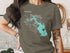 T-shirt with turquoise map graphic of Lake Livingston, Texas, and compass rose.