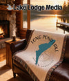 Woven throw with "Long Pond Lake New Hampshire" and lake silhouette design.