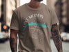 T-shirt with Lake Merwin Washington compass graphic and sleeve tattoos.
