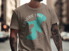 Beige t-shirt with Canobie Lake, New Hampshire map and compass graphic.