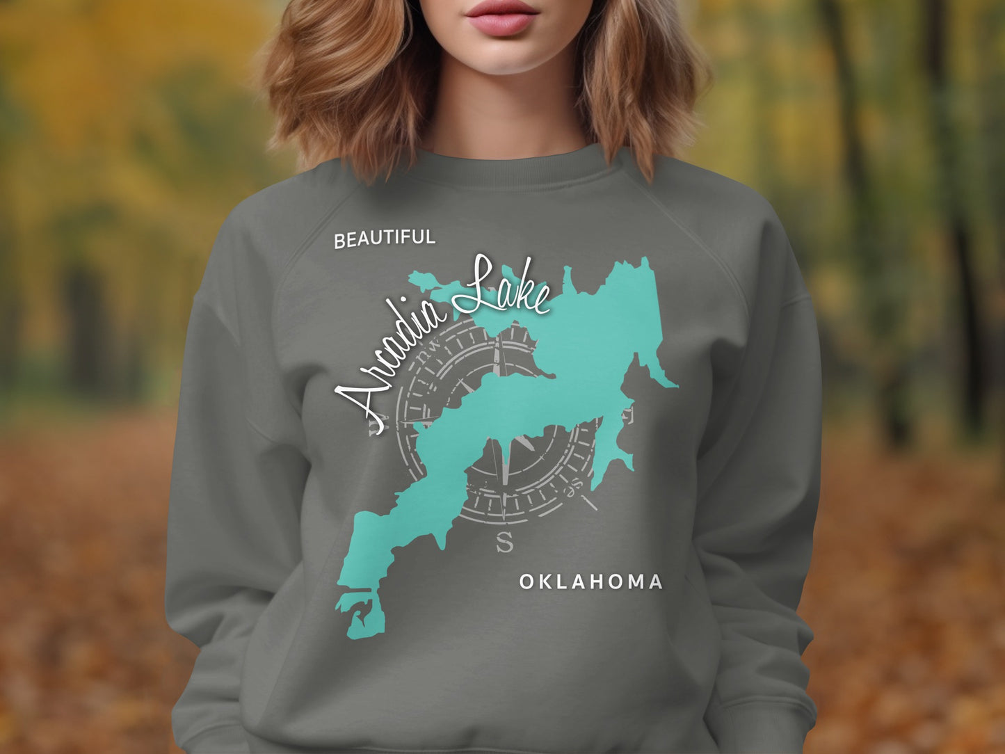 Dark grey sweatshirt with turquoise map of Arcadia Lake, Oklahoma.