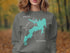 Dark grey sweatshirt with turquoise map of Arcadia Lake, Oklahoma.