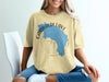 Garibaldi Lake British Columbia graphic on a tan t-shirt with compass design.