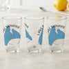 Three clear glasses with blue Lake Manawa map and compass design.