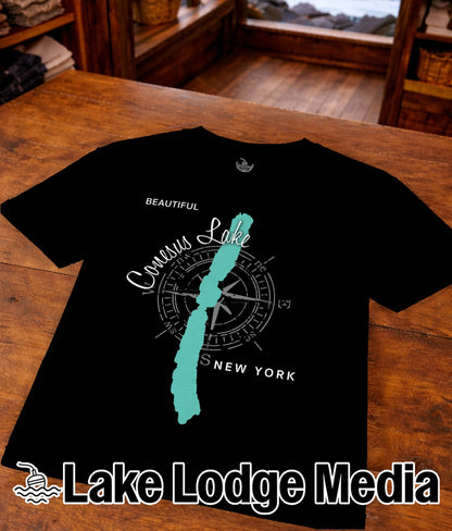 Black t-shirt with "Beautiful Conesus Lake New York" compass graphic.