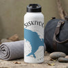 White metal water bottle with Siskiyou map graphic and compass design.
