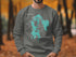 Grey sweatshirt with "Beautiful Lake Massabesic New Hampshire" text and compass.