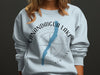 Light blue crewneck sweatshirt with Canandaigua Lake map and compass graphic.