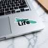 Wenatchee Life sticker on a laptop keyboard.
