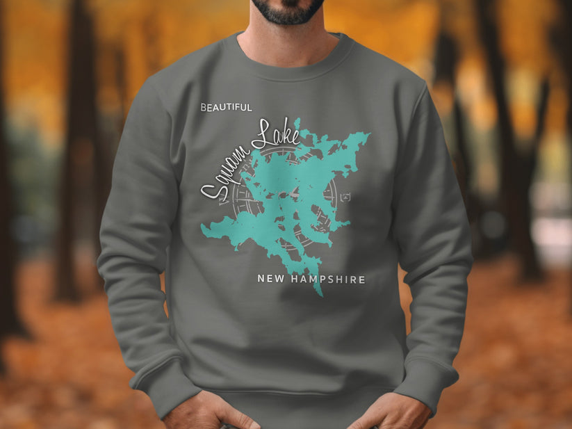 Grey sweatshirt with teal map graphic of Squam Lake, New Hampshire.
