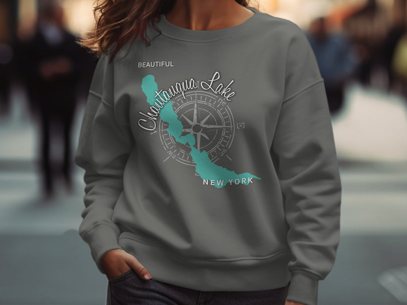 Grey sweatshirt with Chautauqua Lake New York map and compass design.