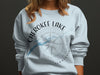 Light grey crewneck sweatshirt with Cherokee Lake map and compass graphic.