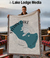 Woven blanket with Sylvan Lake, South Dakota map and compass rose design.