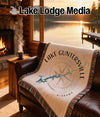 Throw blanket with compass design featuring Lake Guntersville, Alabama map.
