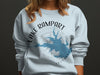 light blue sweatshirt with Lake Rampart Colorado map and compass design
