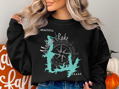 Black sweatshirt with turquoise map of Medina Lake, Texas, and compass rose.