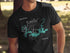 Black t-shirt with a compass rose map of Lake Amistad, Texas.