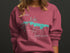 Salmon sweatshirt with "Hamilton Lake New Jersey" and compass graphic.