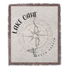 Woven blanket with Lake Oahe compass design and South Dakota text.