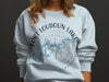 Light blue sweatshirt with Fort Loudoun Lake and compass graphic.
