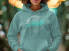 Teal hoodie with "Lake America" text and compass design.