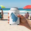 White can koozie with blue Ossipee Lake map and compass design at the beach.
