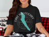 Black t-shirt with Lake Willoughby Vermont design and compass rose.