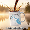 White mug with "Lake Livingston" and Texas map over compass rose.