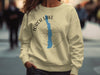 Cream sweatshirt with "Torch Lake Michigan" graphic and compass design.