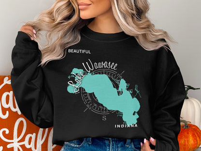 Black sweatshirt with teal Lake Wawasee Indiana map and compass graphic.