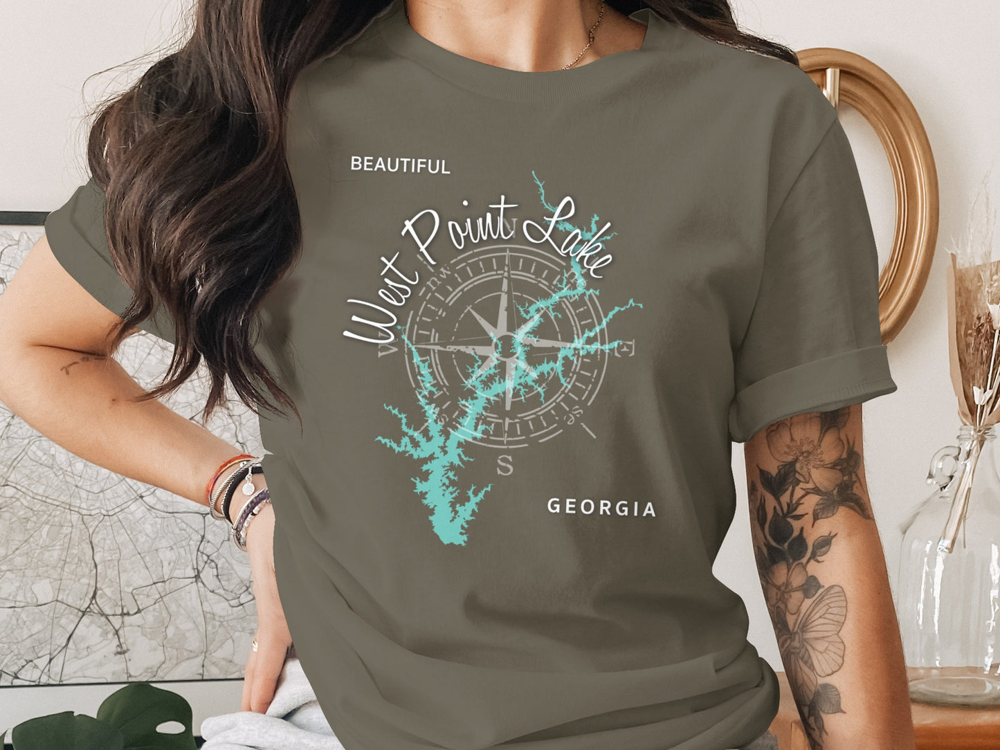 T-shirt with compass rose graphic and "West Point Lake Georgia" text.