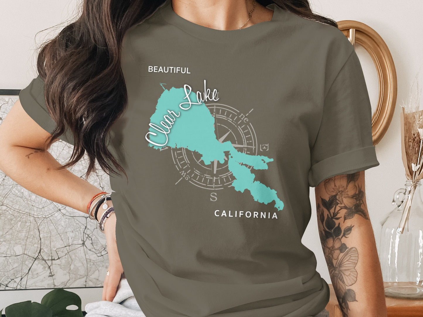 T-shirt graphic of Clear Lake, California, with compass rose and text.