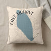 Cream pillow with blue Lake Mojave map graphic and text.
