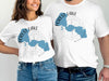 White t-shirts with "Forest Lake Minnesota" map design and compass graphic.