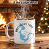 White mug with Broadway Lake, South Carolina design and compass rose.