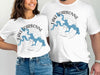 White t-shirts featuring a blue map of Lake D'Arbonne and compass rose.