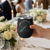 Black tumbler with compass and Lake Guntersville Alabama map graphic held by hand.