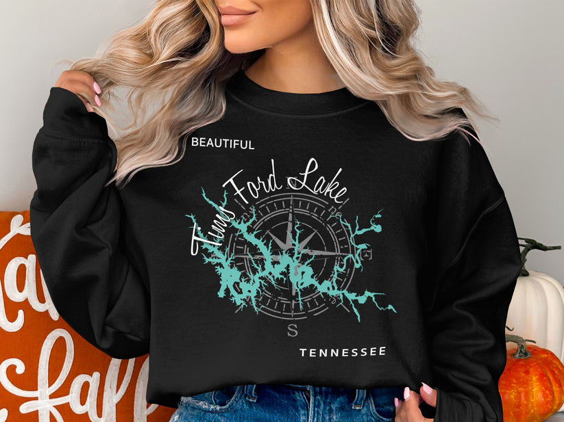 Black sweatshirt with "Beautiful Tim's Ford Lake Tennessee" text and compass rose design.