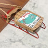 Wooden sled ornament with red runners and "Merry Christmas From Lake McConaughy" text.
