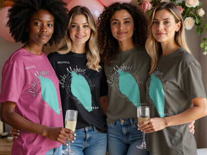 Four women in t-shirts with a Lake Mohave, Nevada graphic and compass rose design.