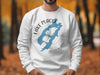 White sweatshirt with Lake Placid New York map and compass graphic.